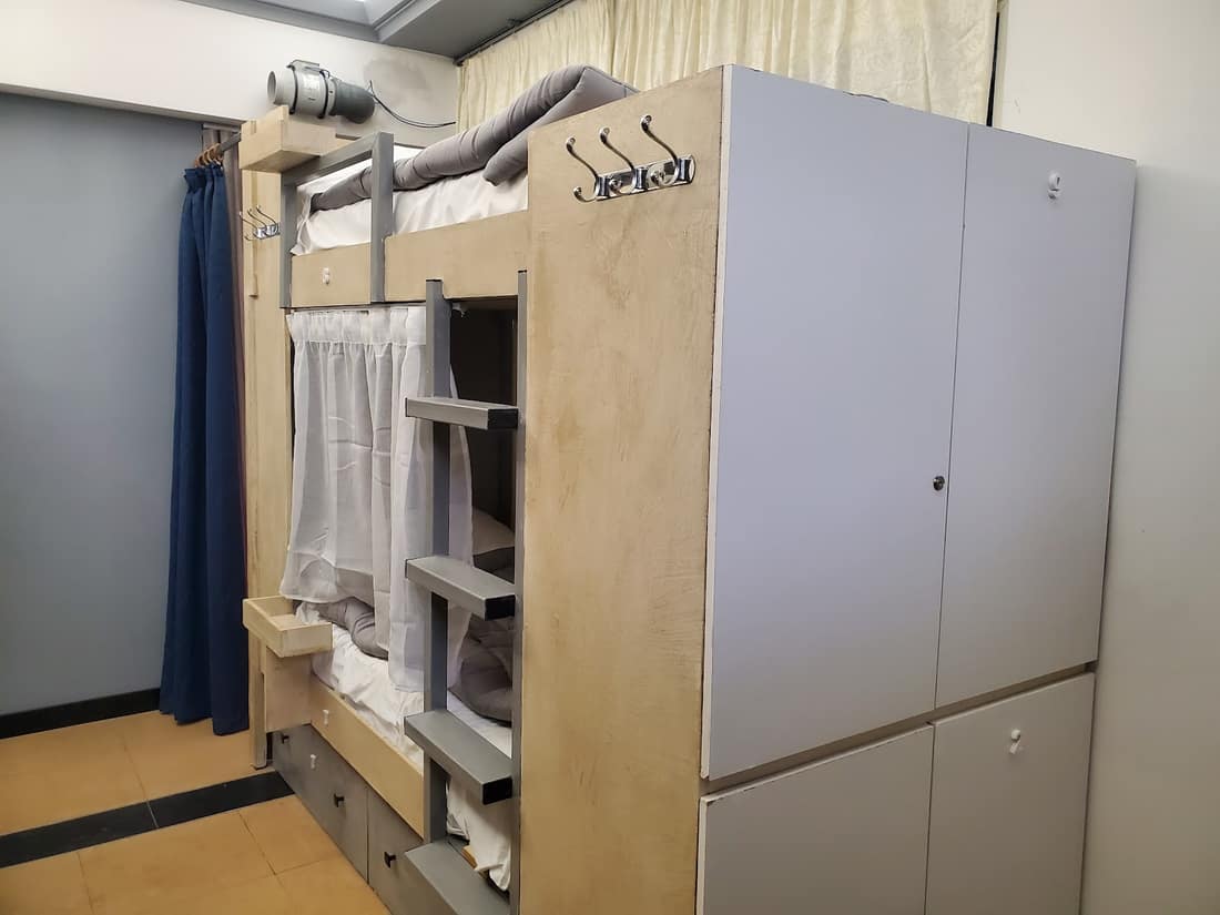 Tall lockers built into the end of the bunks